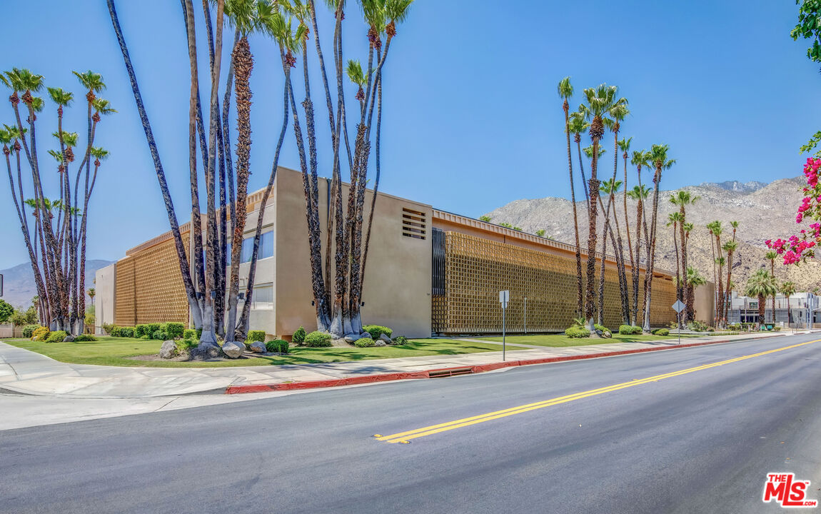 277 East Alejo Road, Unit 119 Palm Springs, CA 92262 - Photo 35 of 46 a view of a building with a street