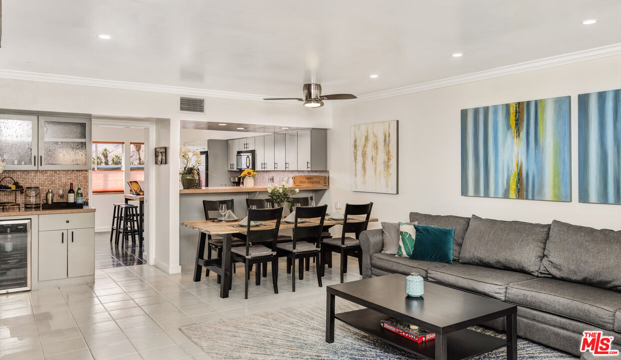 277 East Alejo Road, Unit 119 Palm Springs, CA 92262 - Photo 7 of 46 a living room with stainless steel appliances kitchen island granite countertop furniture and a kitchen view