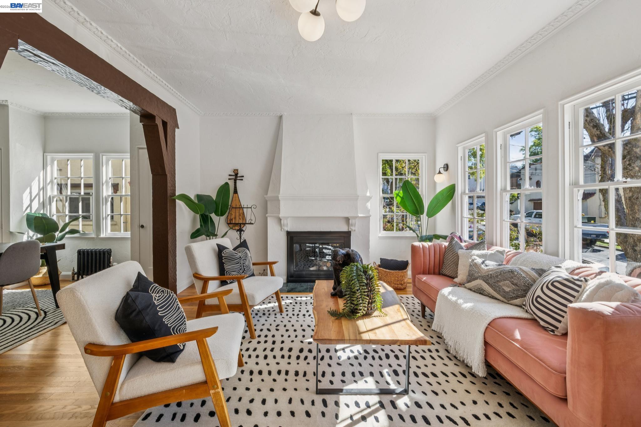 2365 Virginia Street, Unit 2 Berkeley, CA 94709 - Photo 1 of 19 a living room with furniture a fireplace and a window