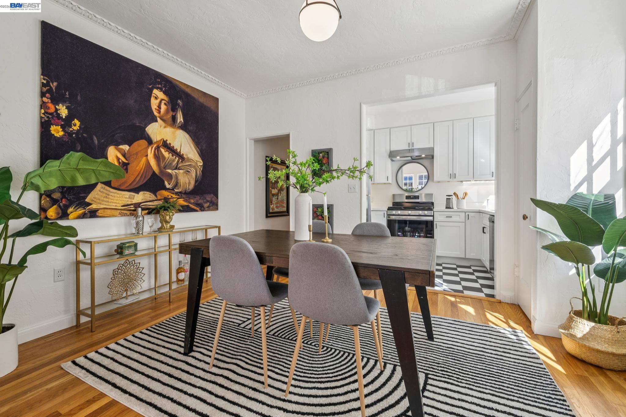 2365 Virginia Street, Unit 2 Berkeley, CA 94709 - Photo 11 of 19 a view of a dining room with furniture and wooden floor