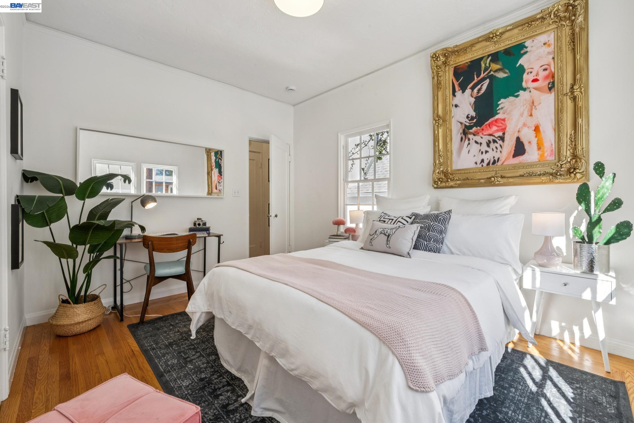 2365 Virginia Street, Unit 2 Berkeley, CA 94709 - Photo 18 of 19 a bedroom with a bed and a painting on the wall