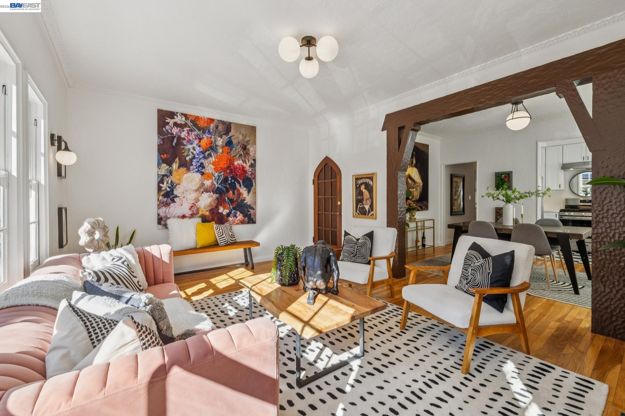 2365 Virginia Street, Unit 2 Berkeley, CA 94709 - Photo 8 of 19 a living room with furniture and a chandelier