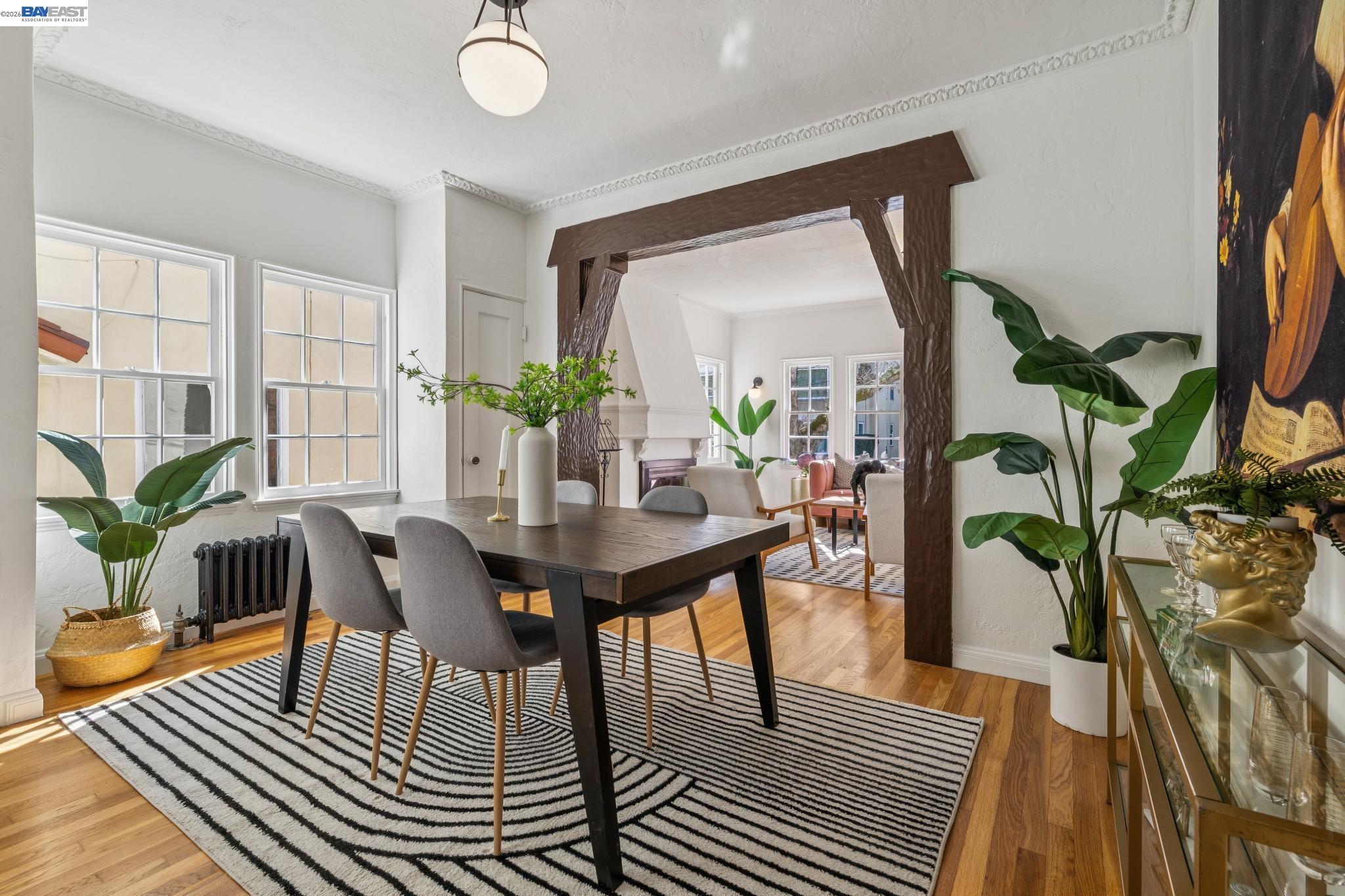 2365 Virginia Street, Unit 2 Berkeley, CA 94709 - Photo 10 of 19 a view of a dining room with furniture and wooden floor