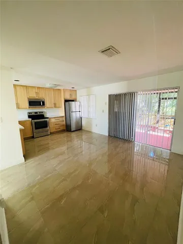 a view of a livingroom with furniture