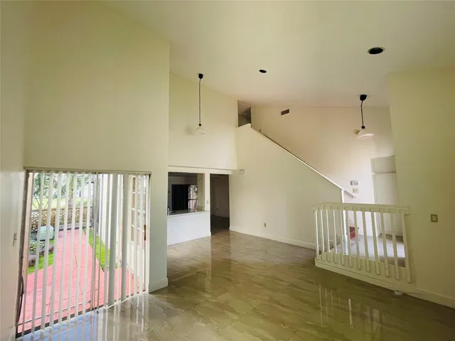 a view of entryway with stairs