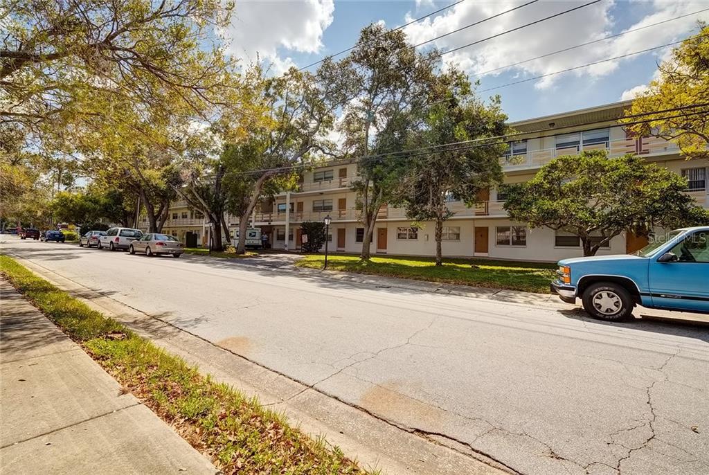 911 Washington Avenue Southwest, Unit 217 Largo, FL 33770 - Photo 1 of 1 a view of street with parked cars