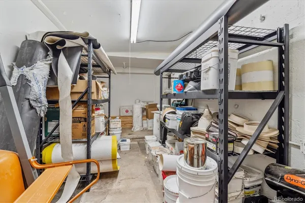 a view of gym equipment and living room