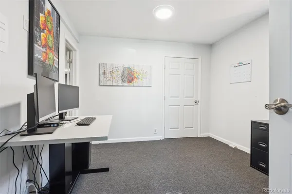 a room with table and chairs