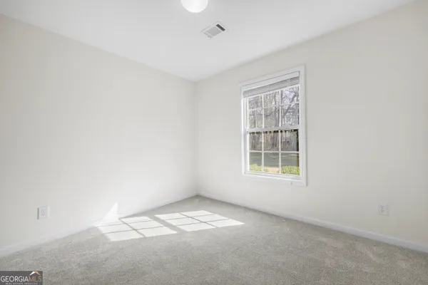 an empty room with a window