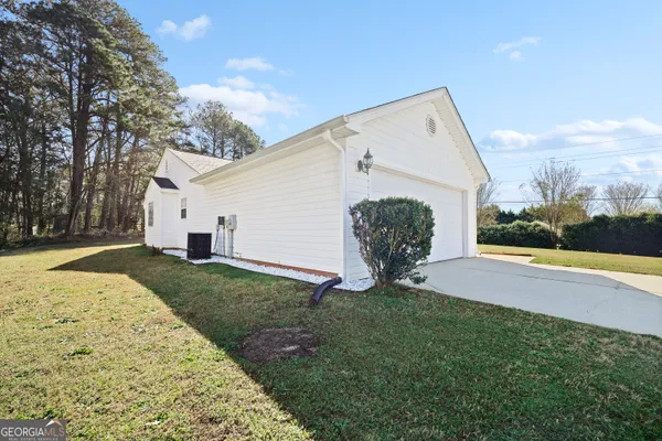 a view of a backyard of the house