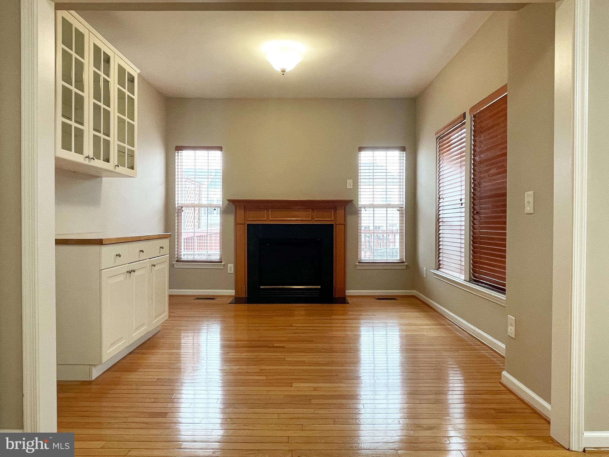21795 Willesden Jct Terrace Sterling, VA 20166 - Photo 26 of 53 TV room next to kitchen