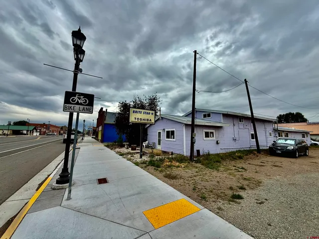 a view of a street with houses
