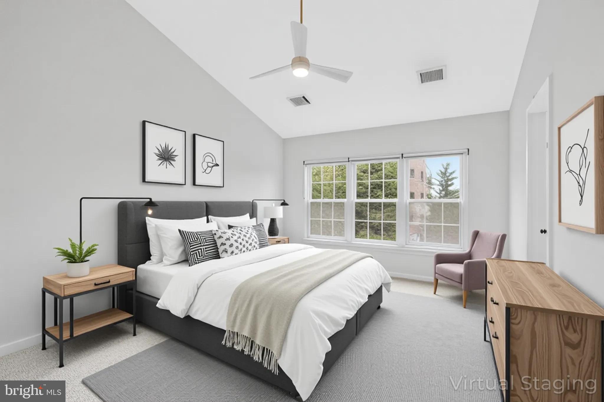 12033 Edgemere Circle Reston, VA 20190 - Photo 22 of 53 a bedroom with a large bed and a window