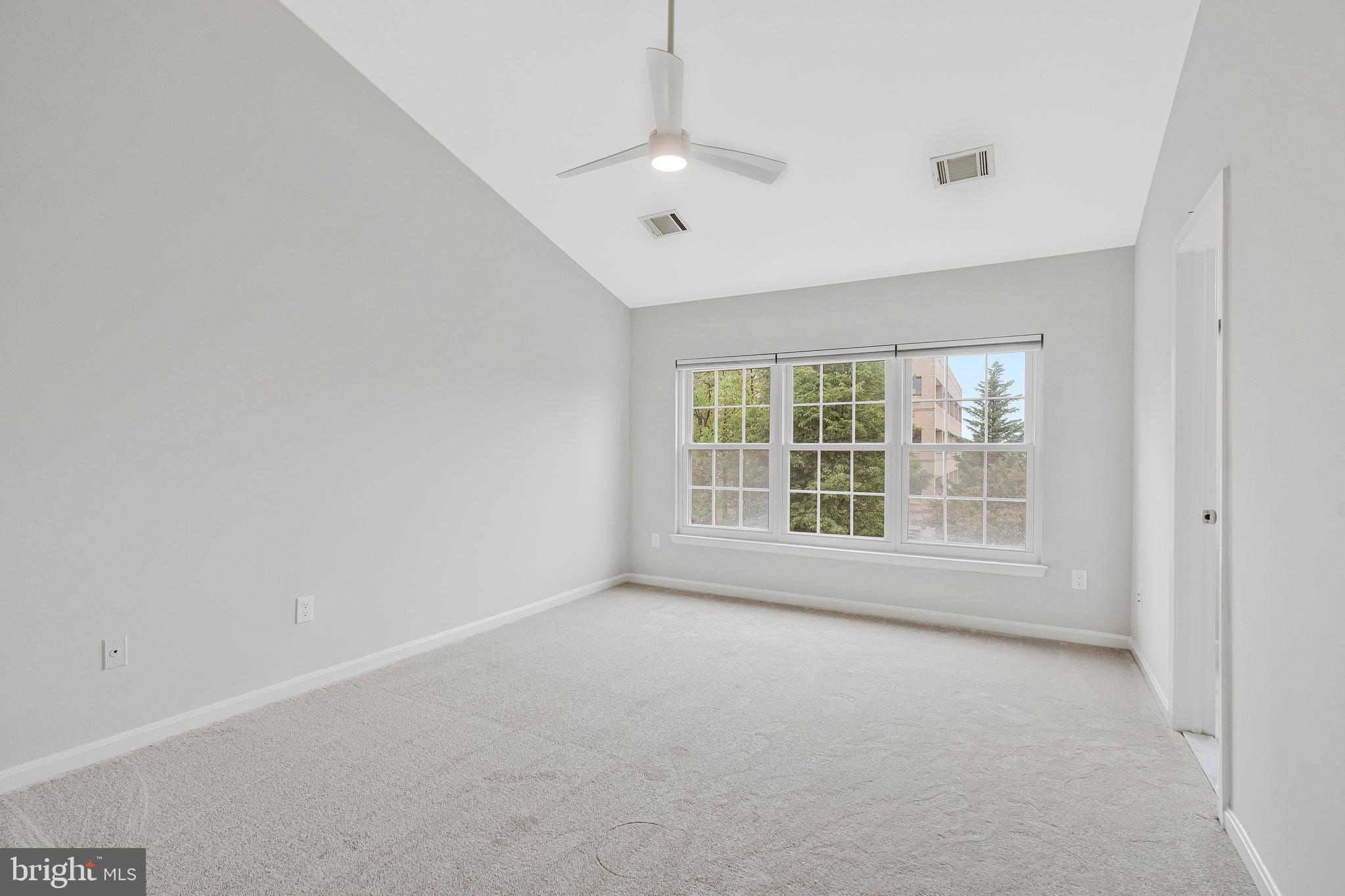 12033 Edgemere Circle Reston, VA 20190 - Photo 23 of 53 a view of an empty room with a window