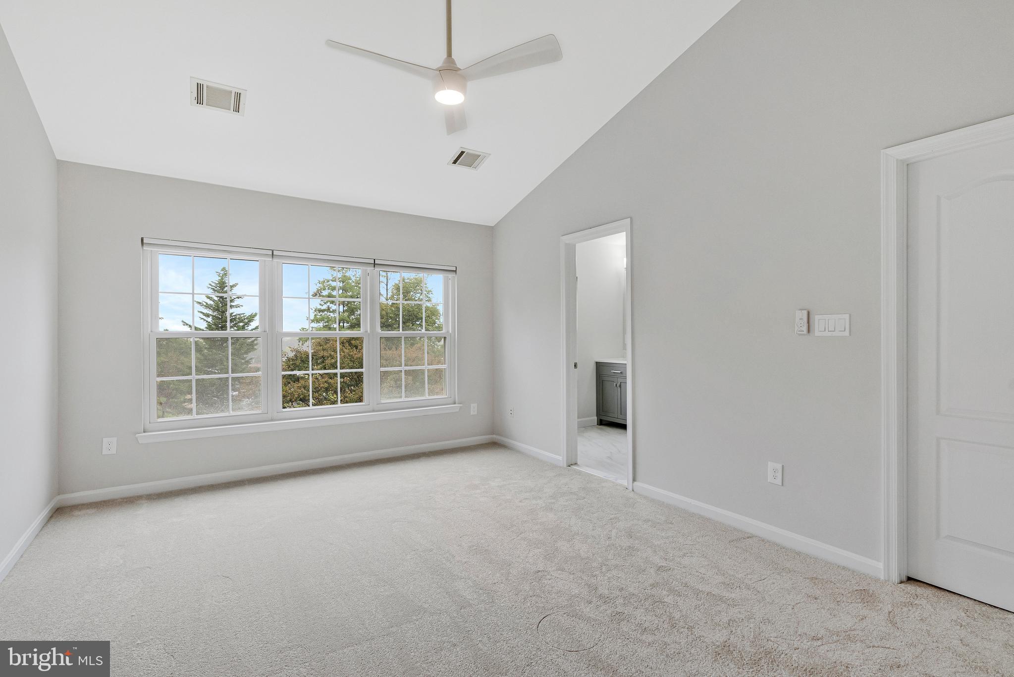12033 Edgemere Circle Reston, VA 20190 - Photo 24 of 53 a view of an empty room with a window