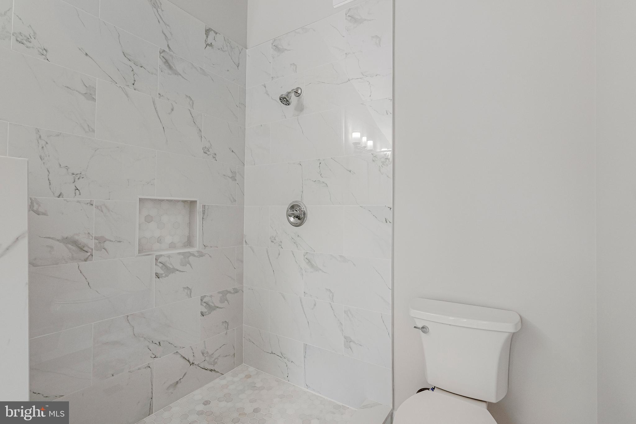 12033 Edgemere Circle Reston, VA 20190 - Photo 28 of 53 a bathroom with a shower