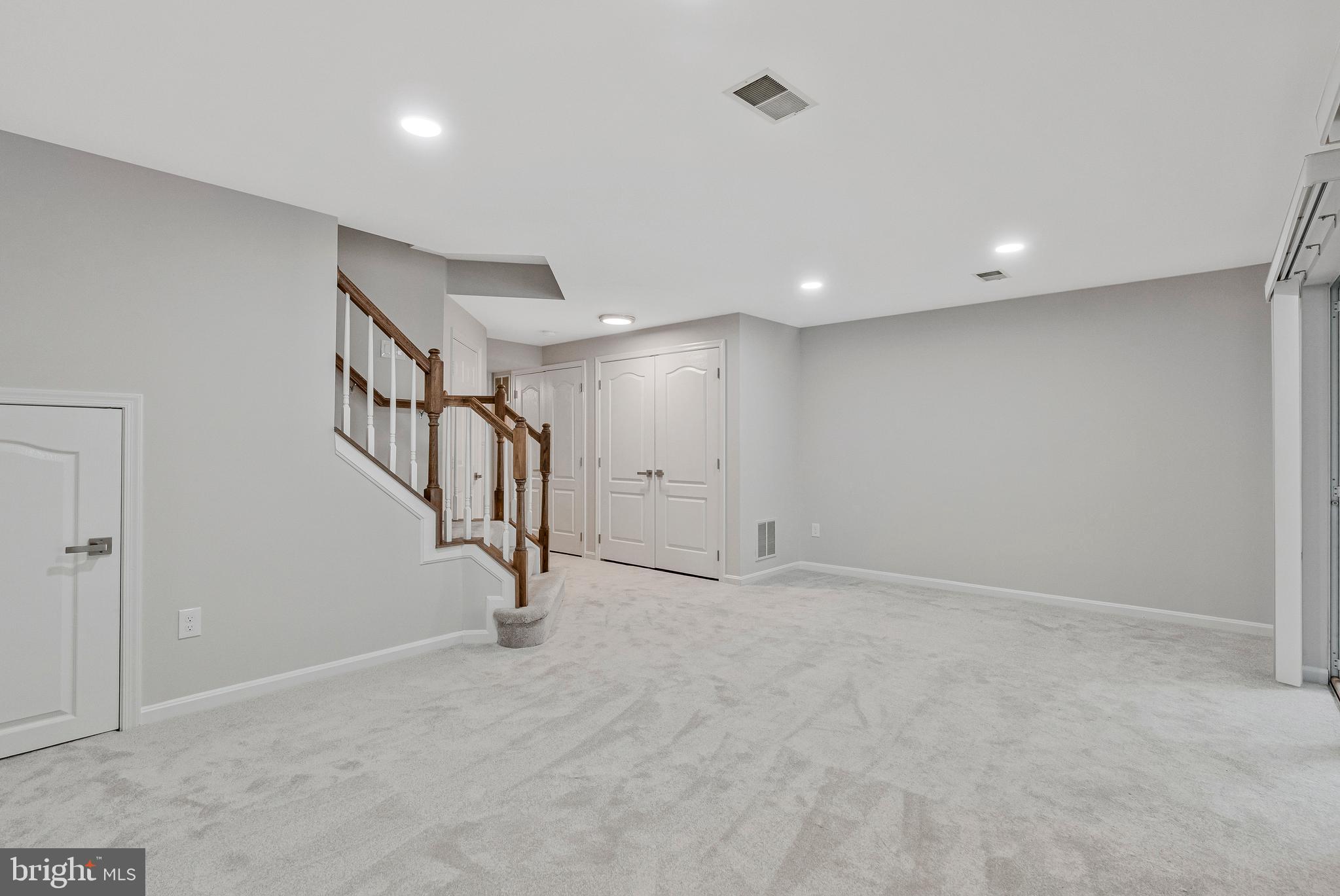 12033 Edgemere Circle Reston, VA 20190 - Photo 36 of 53 a view of an empty room with staircase