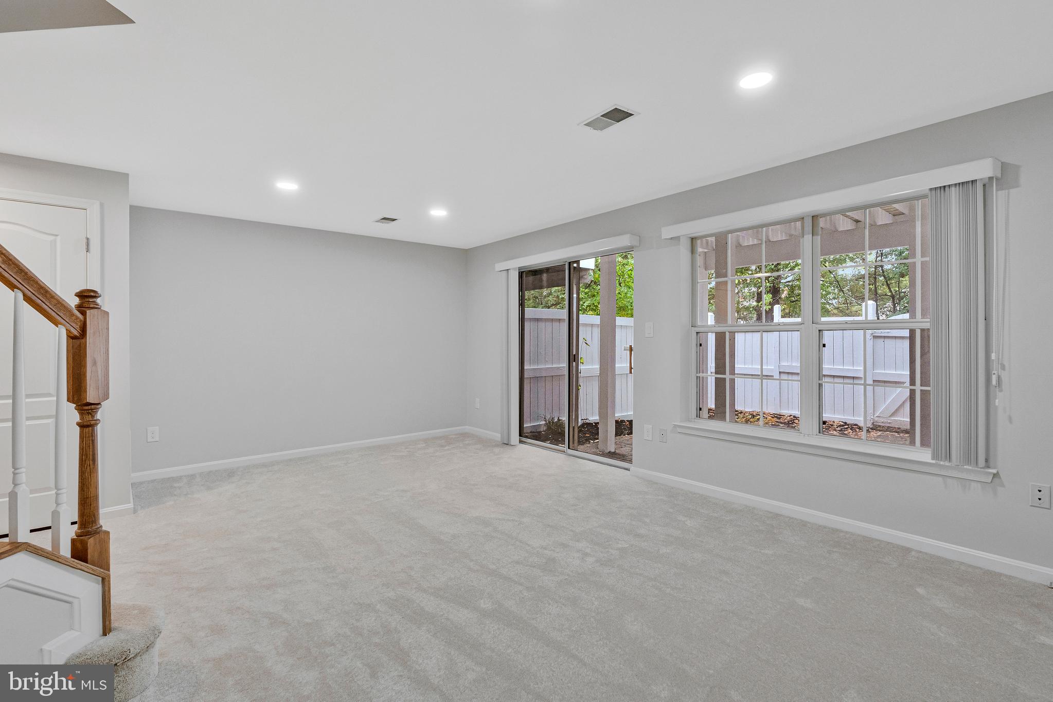 12033 Edgemere Circle Reston, VA 20190 - Photo 37 of 53 a view of an empty room with a window