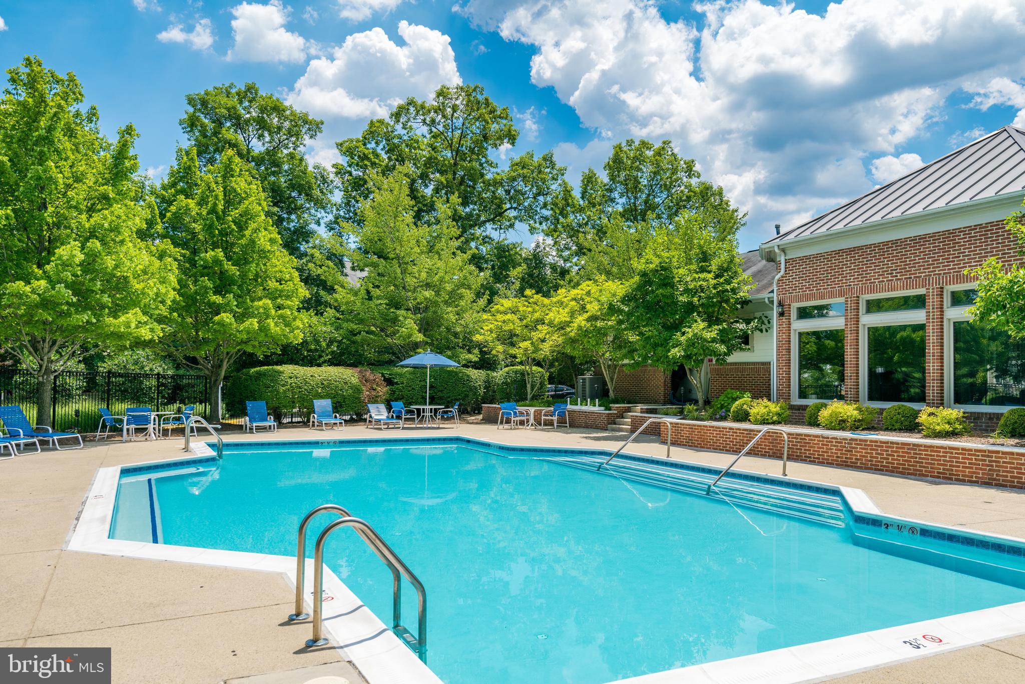 12033 Edgemere Circle Reston, VA 20190 - Photo 45 of 53 a view of a house with a backyard porch and sitting area