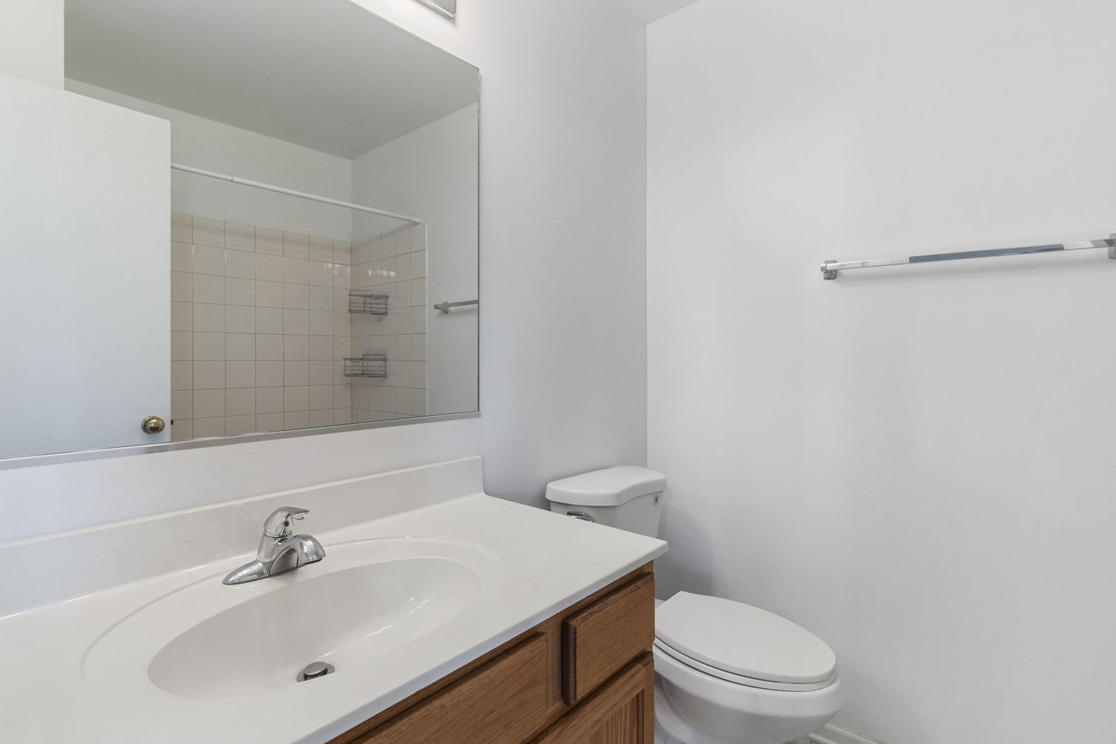 106 Brookhaven Court Sugar Grove, IL 60554 - Photo 13 of 18 a bathroom with a sink a toilet and shower