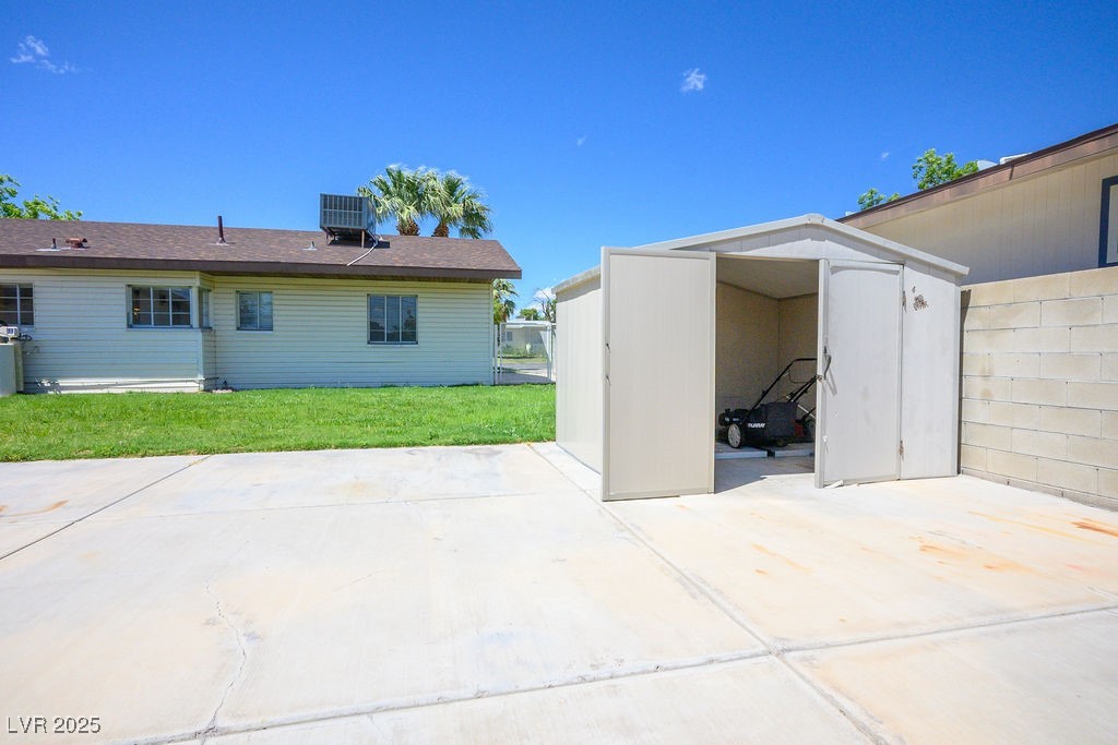 633 5th Street Boulder City, NV 89005 - Photo 26 of 29 View of patio featuring a storage shed