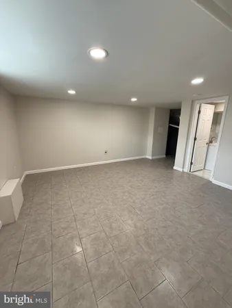 a bathroom with a toilet and shower