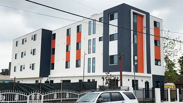 a front view of a building and a street