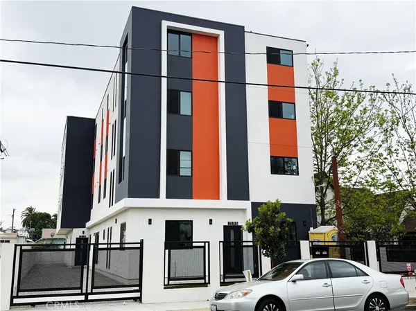 a view of a street with cars