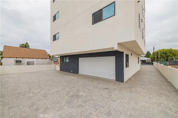 a view of an empty room with a garage