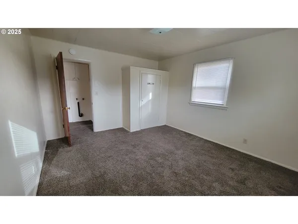 a open hall with a back yard