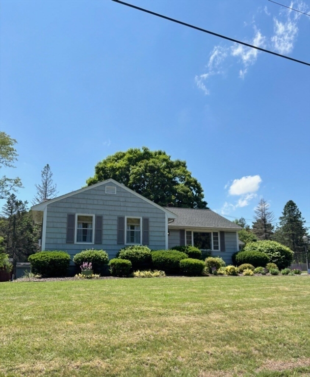29 Old Ferry Road Haverhill, MA 01830 - Photo 4 of 42 a front view of a house with a yard