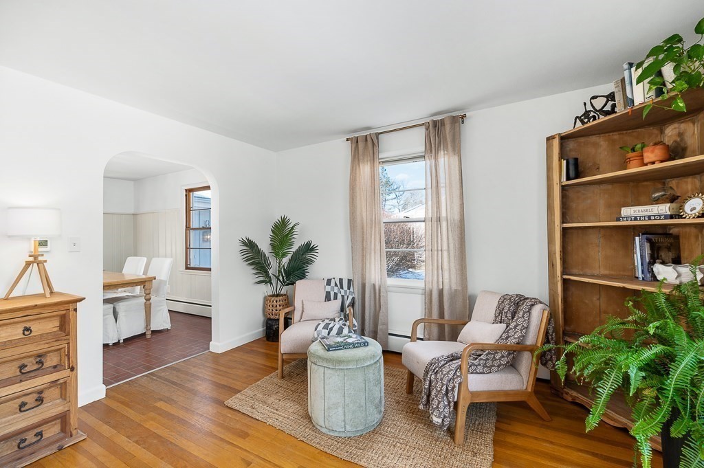 29 Old Ferry Road Haverhill, MA 01830 - Photo 9 of 42 a living room with furniture and a potted plant