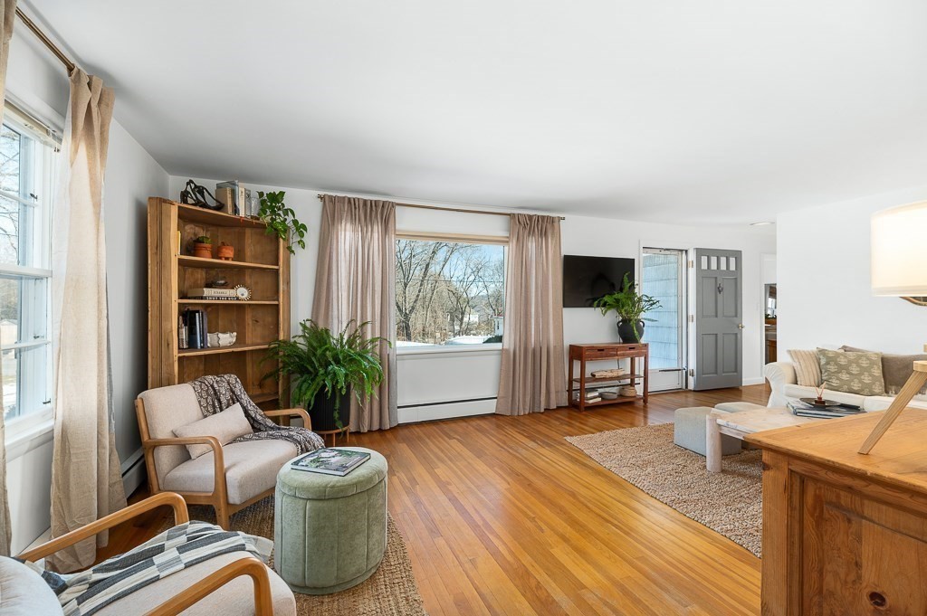 29 Old Ferry Road Haverhill, MA 01830 - Photo 10 of 42 a living room with furniture large window and flat screen tv