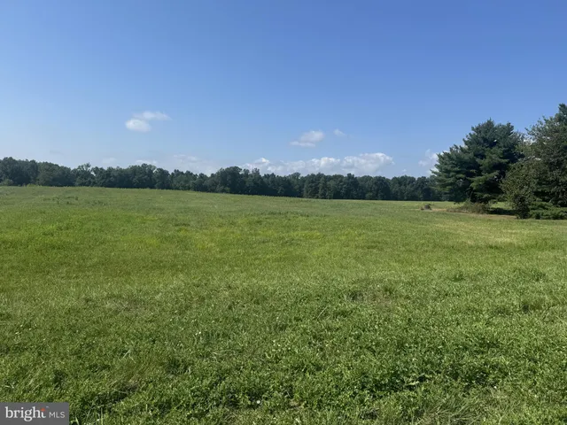 a view of an ocean and a mountain