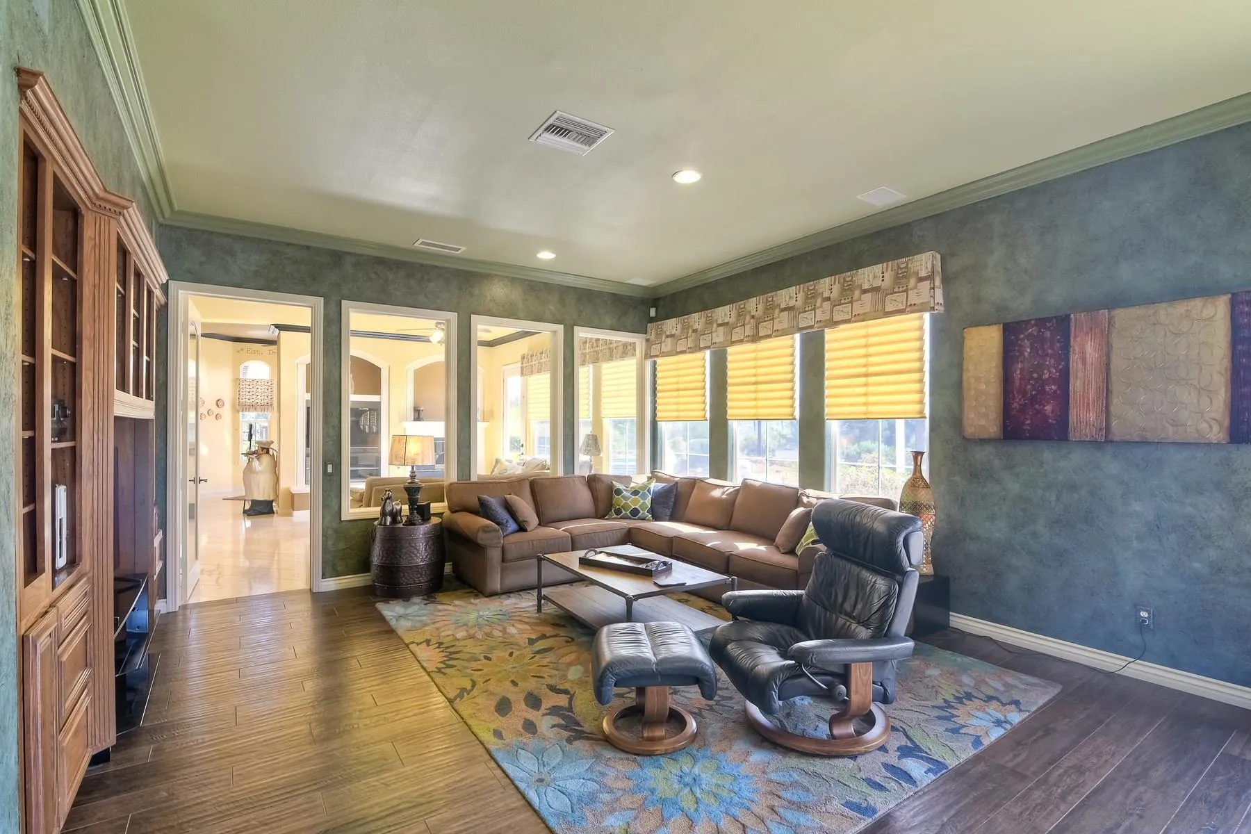 13675 Antelope Station Poway, CA 92064 - Photo 13 of 33 a living room with furniture wooden floor and a table
