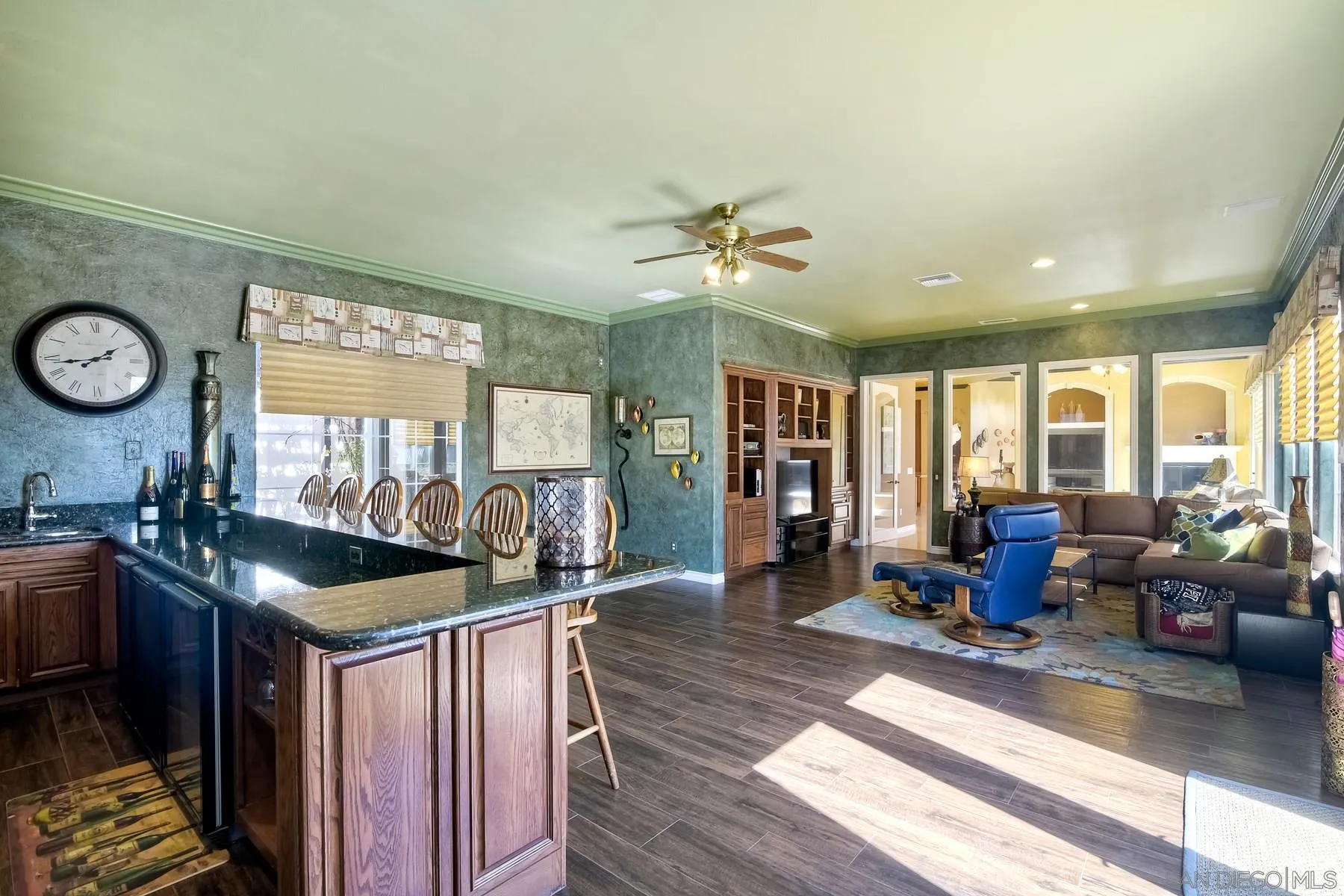 13675 Antelope Station Poway, CA 92064 - Photo 14 of 33 a kitchen with granite countertop a stove and a wooden floors