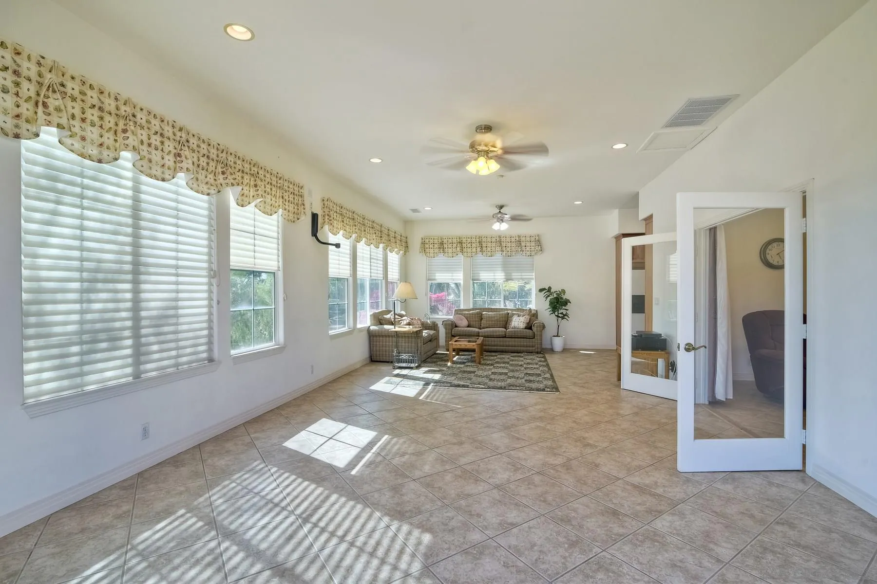 13675 Antelope Station Poway, CA 92064 - Photo 26 of 33 a view of a room with gym equipment and a large window