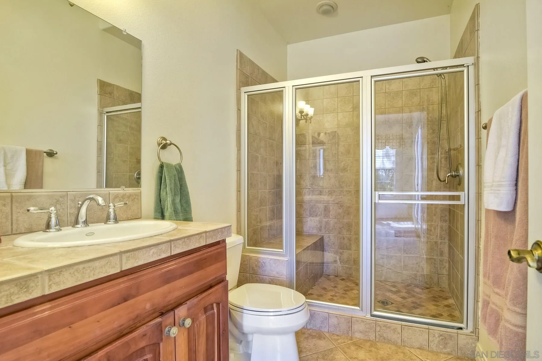 13675 Antelope Station Poway, CA 92064 - Photo 28 of 33 a bathroom with a sink toilet and shower