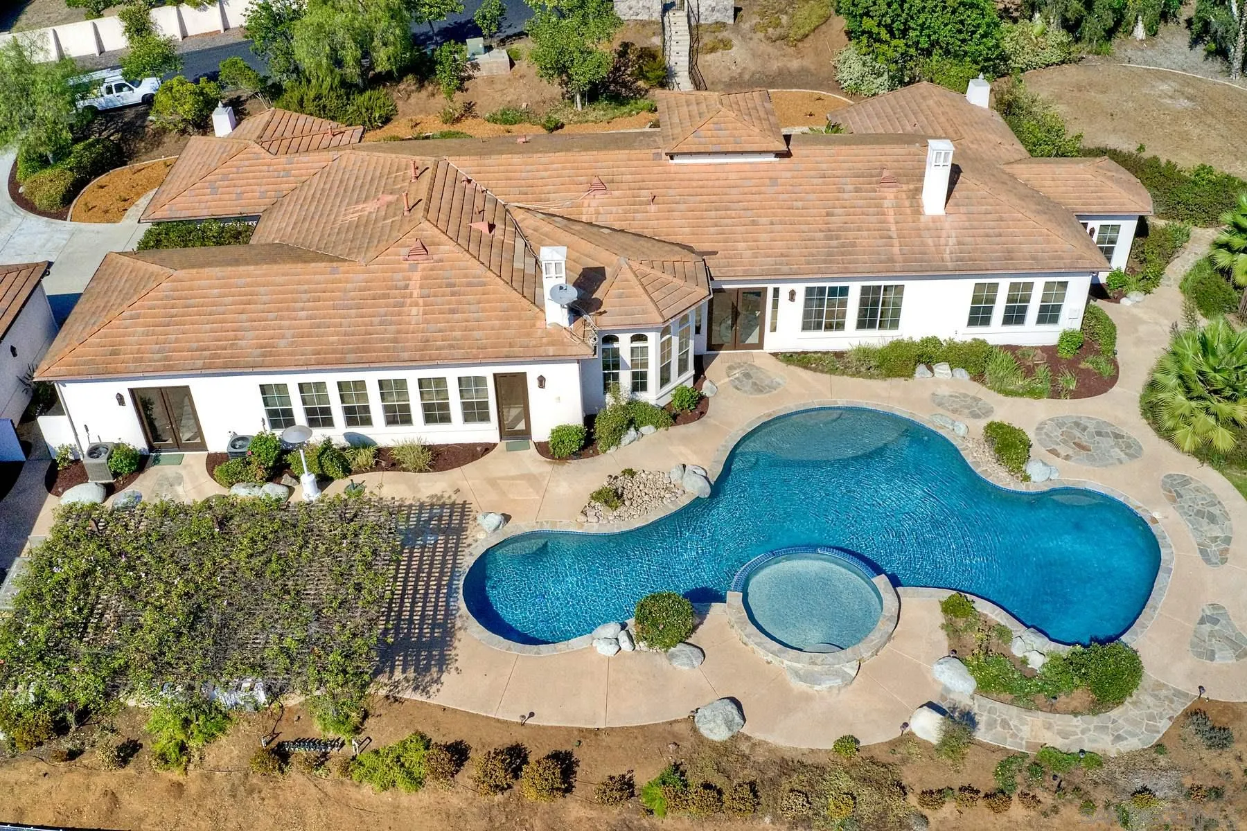 13675 Antelope Station Poway, CA 92064 - Photo 31 of 33 an aerial view of a house with swimming pool and a yard