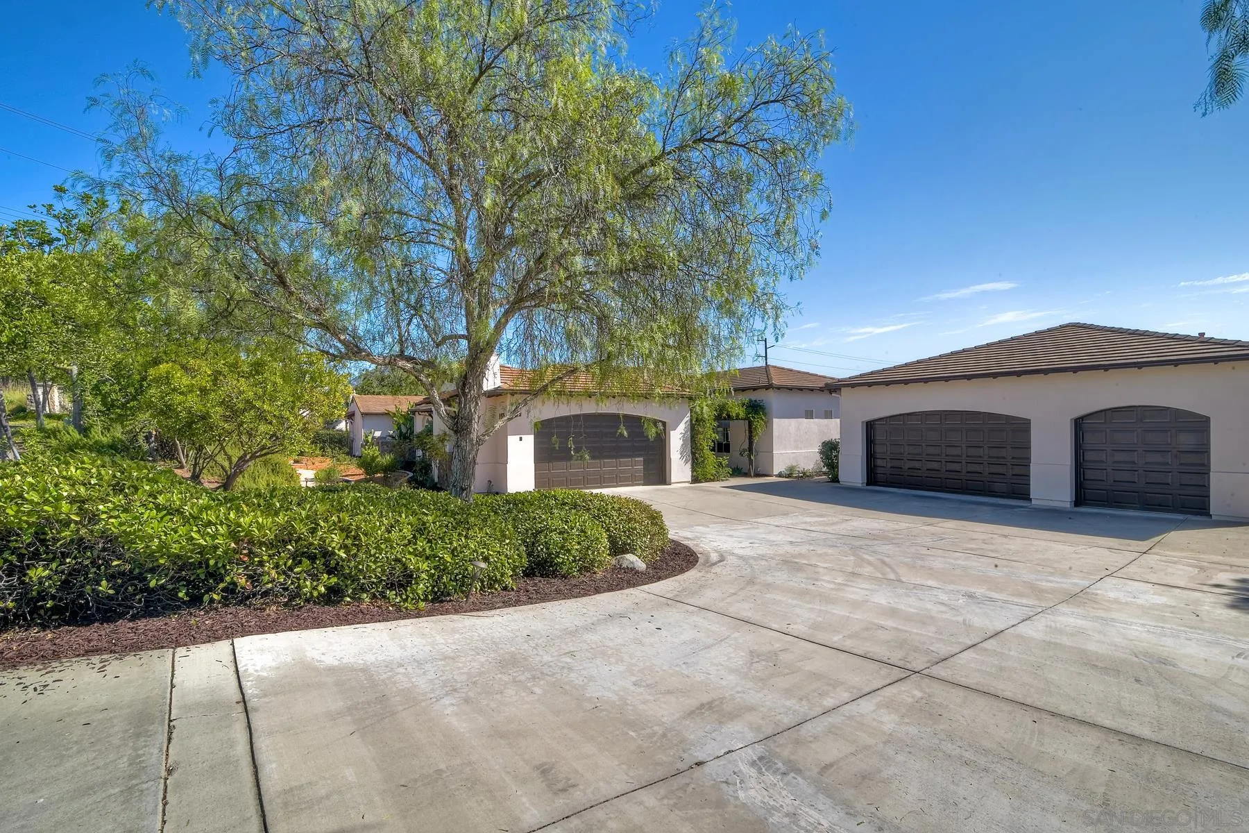 13675 Antelope Station Poway, CA 92064 - Photo 32 of 33 a front view of a house with a yard and garage