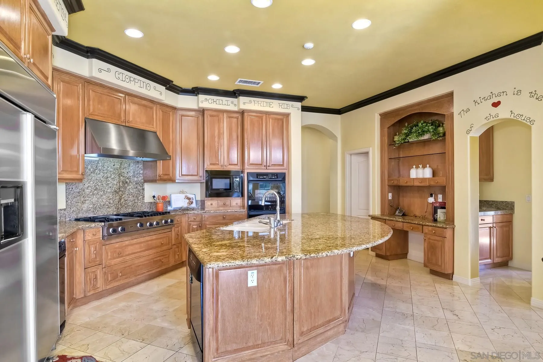 13675 Antelope Station Poway, CA 92064 - Photo 8 of 33 a kitchen with stainless steel appliances granite countertop a stove top oven a sink dishwasher and cabinets with wooden floor