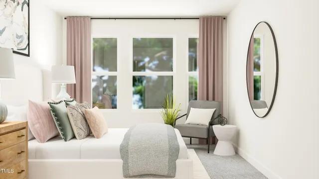 a bedroom with bed and a large window