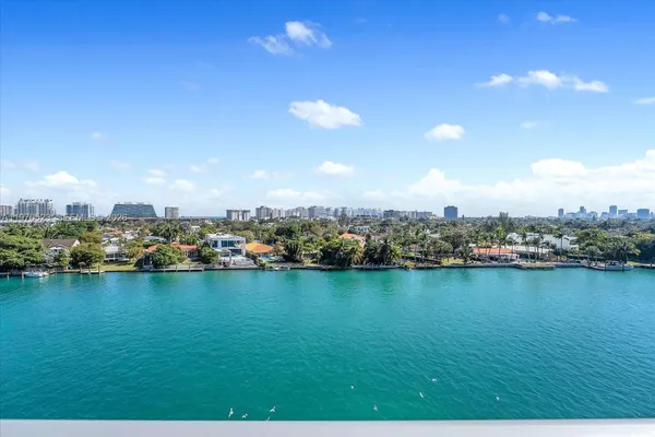 an aerial view of city and lake view