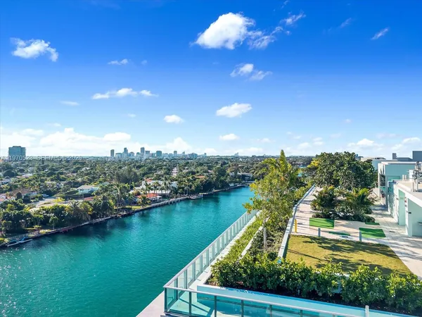 a view of a lake with a city