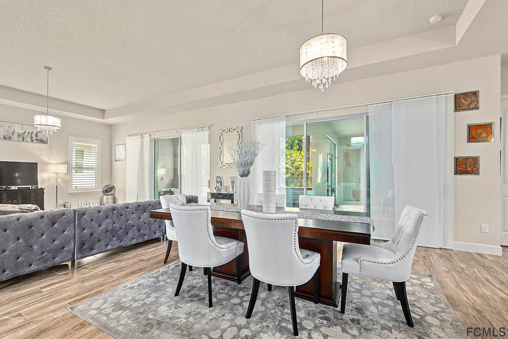 902 Creekwood Drive Ormond Beach, FL 32174 - Photo 4 of 42 Dining Room/Family Room