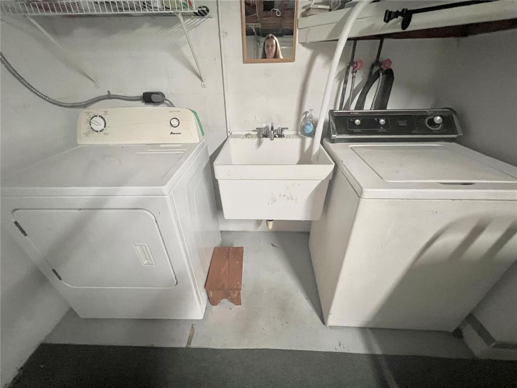 5145 Cicero Drive New Port Richey, FL 34652 - Photo 18 of 19 a utility room with dryer and washer