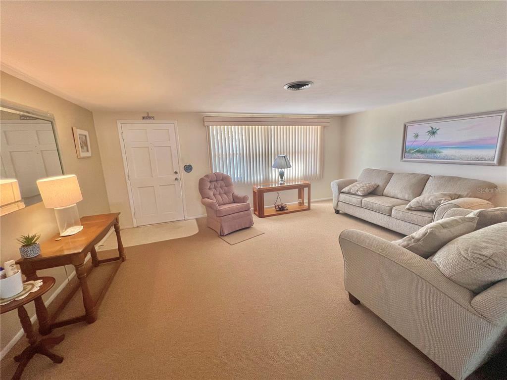 5145 Cicero Drive New Port Richey, FL 34652 - Photo 4 of 19 a living room with furniture and a window