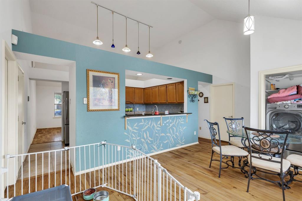 8405 Spinnaker Cove Rowlett, TX 75089 - Photo 16 of 30 a room with furniture and wooden floor