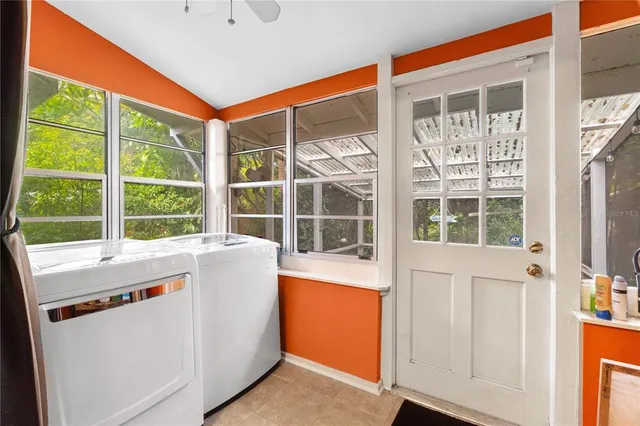 a view of an empty room with a large window