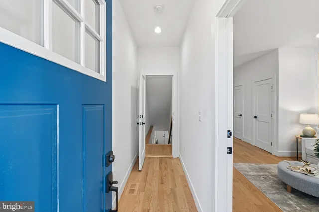 a view of a bathroom from the hallway